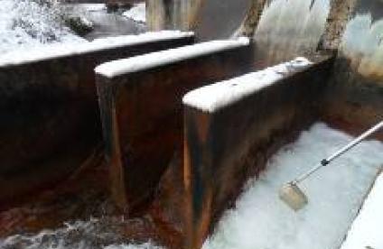 Prélèvement d'eau dans l'exhaure de la Paix